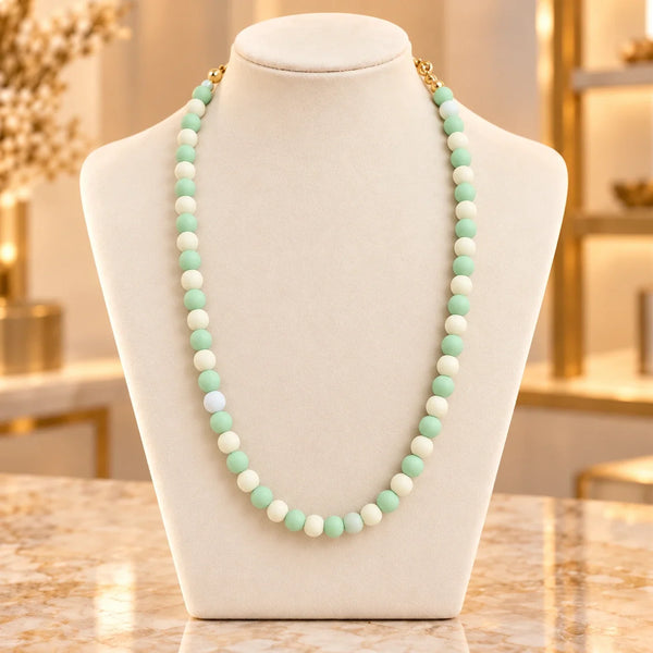 AA-G02 · Obsequio Menta & Marfil · Exhibidor boutique